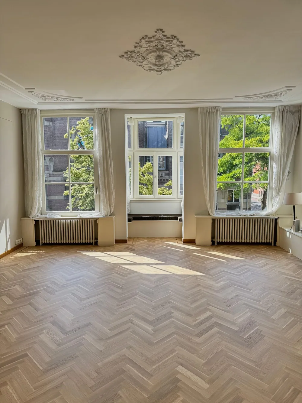 Een door Vloer Schuur Expert gerenoveerde houten vloer, voorbeeld 5